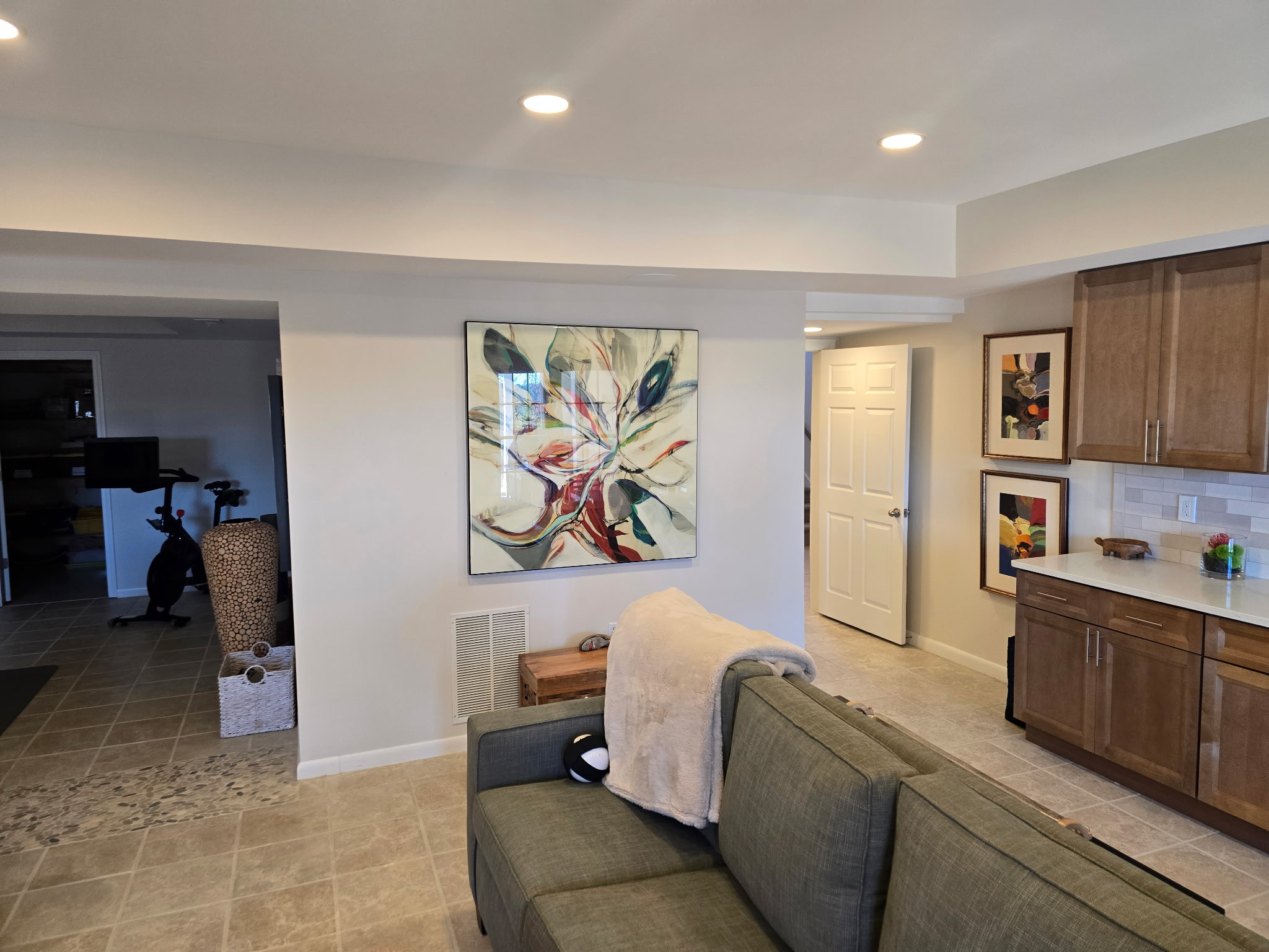 Basement entertainment space with wet bar